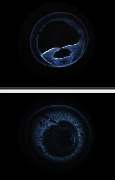 Two images of a blue eye with black background